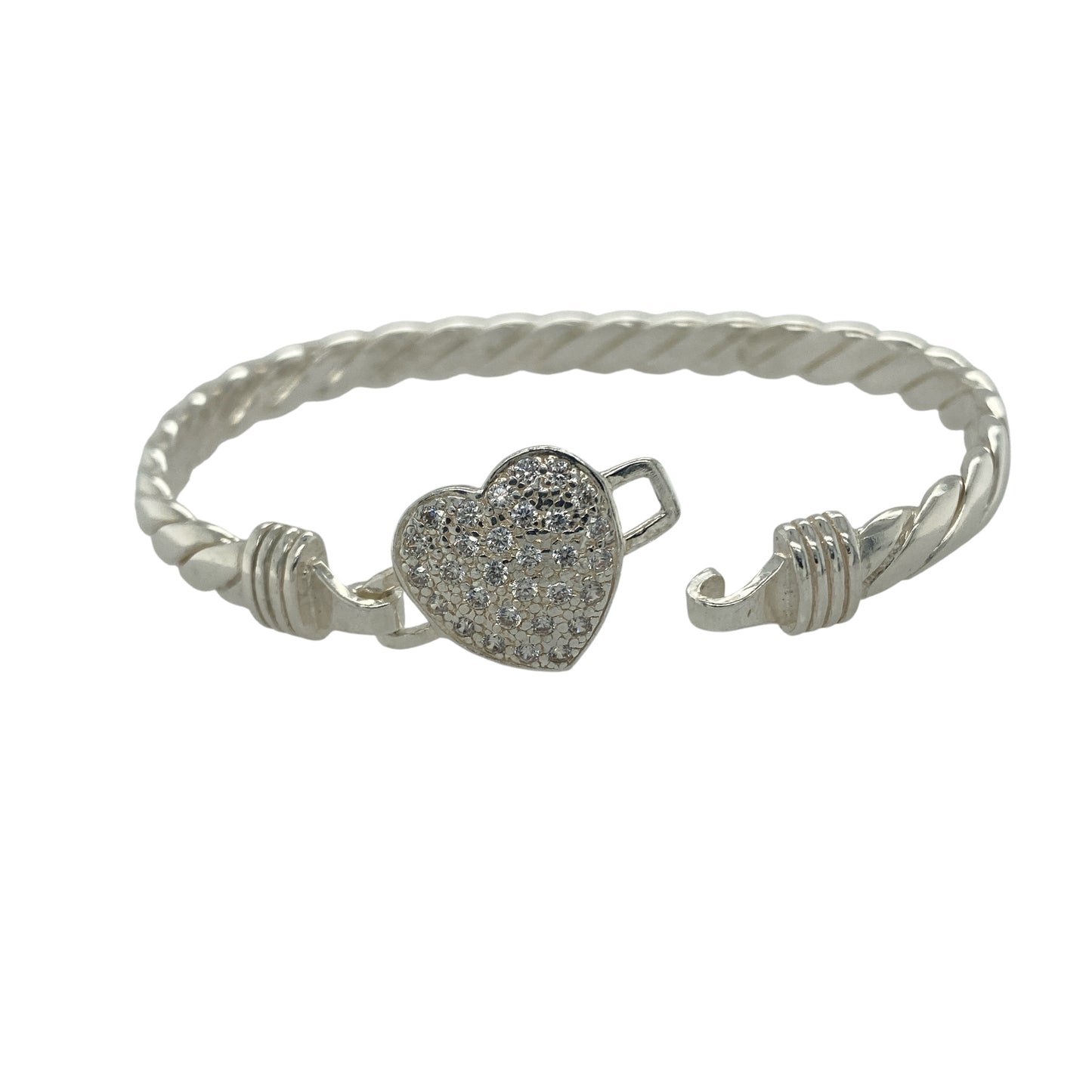 Bring elegance and romantic sparkle to your collection with this new 925 silver cubic zirconia heart bangle, a beautifully designed piece that combines sentiment with style.
Design: The bangle features a 15mm high heart motif at the front, accented with sparkling cubic zirconia stones and set on a solid twisted silver band for a distinctive and elegant look.
Material: Made from solid 925 sterling silver, the polished finish enhances the brilliance of the stones and highlights the detailed twist design.