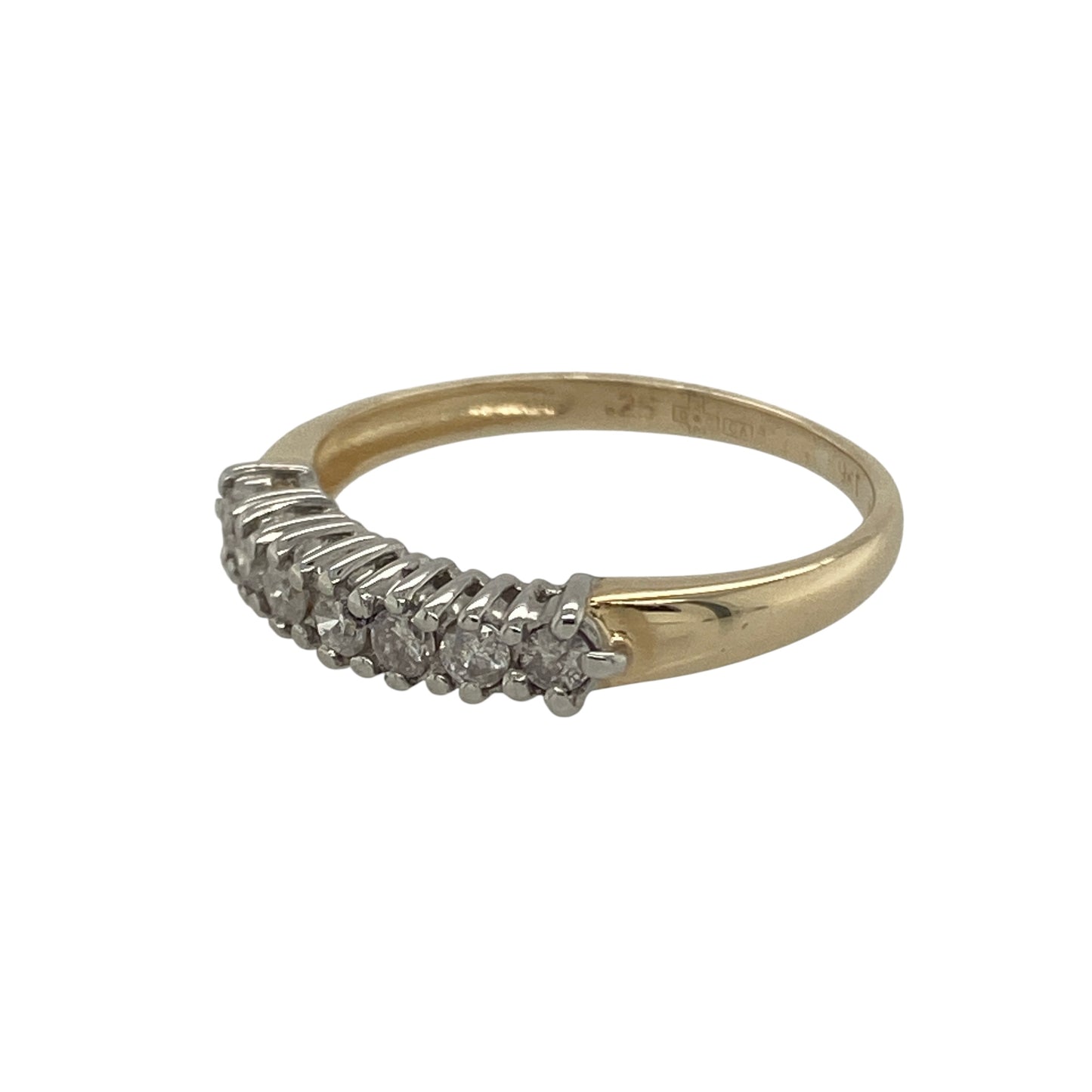 Bring subtle sparkle and timeless elegance to your collection with this pre-owned 9ct yellow gold diamond band ring—a classic design that pairs simplicity with refined brilliance.
Design: The ring features seven brilliant-cut diamonds set across the band, offering a continuous line of sparkle with an approximate total diamond weight of 0.25ct. The clean, balanced arrangement gives it a graceful and versatile style.