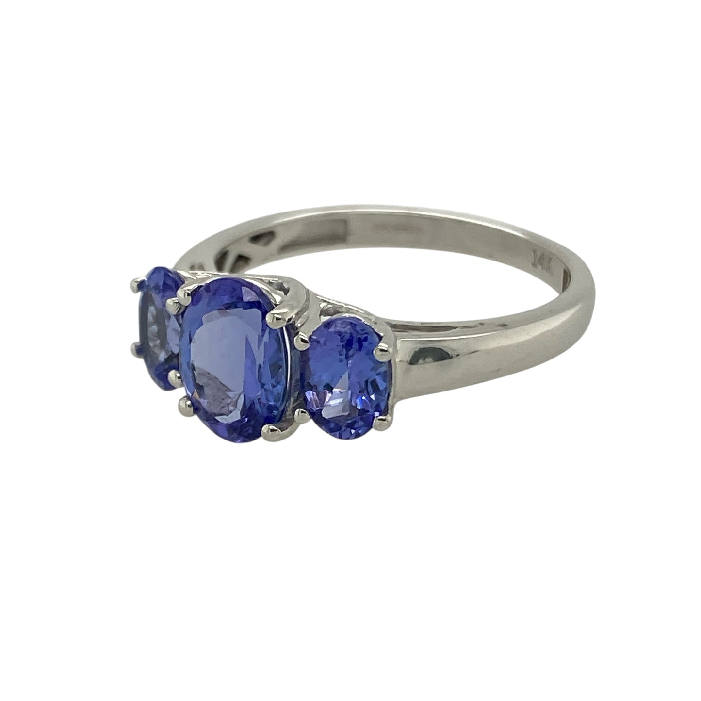 ChatGPT said:
Bring colour, elegance, and refined beauty to your collection with this pre-owned 14ct white gold tanzanite oval trilogy ring—a sophisticated design that captures timeless style and graceful allure.
Design: The ring features three oval-cut tanzanite gemstones in a classic trilogy arrangement, symbolising the past, present, and future. The centre stone measures 8mm by 6mm, framed by two side stones each measuring 6mm by 4mm, creating a balanced and harmonious look.