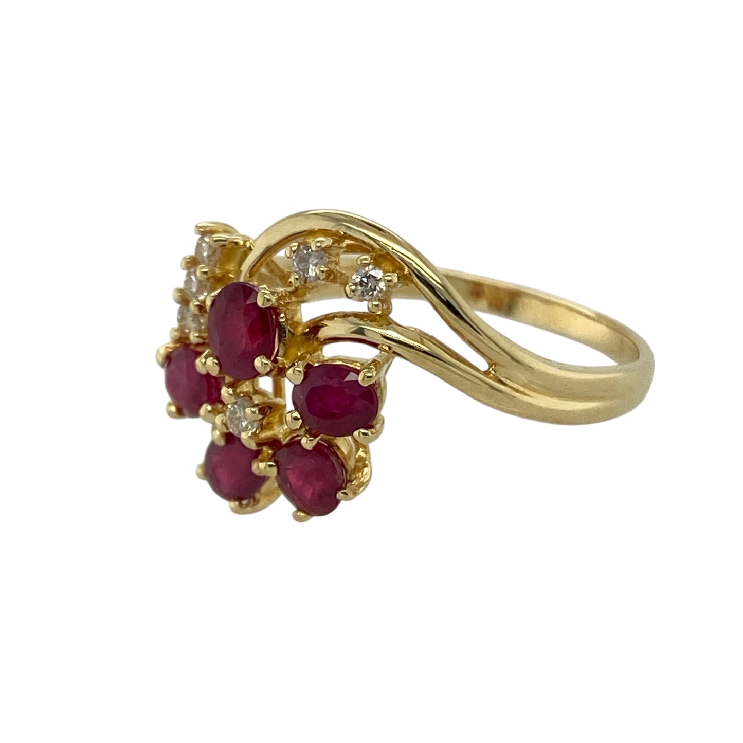Bring colour, sparkle, and timeless elegance to your collection with this pre-owned 18ct yellow gold diamond and ruby flower style ring—a stunning piece that combines classic beauty with refined craftsmanship.
Design: The ring features a floral-inspired cluster design with vibrant rubies forming the petals and sparkling diamonds accenting the arrangement, creating a radiant display of colour and brilliance. The intricate setting enhances the vintage charm and elegance of the piece.