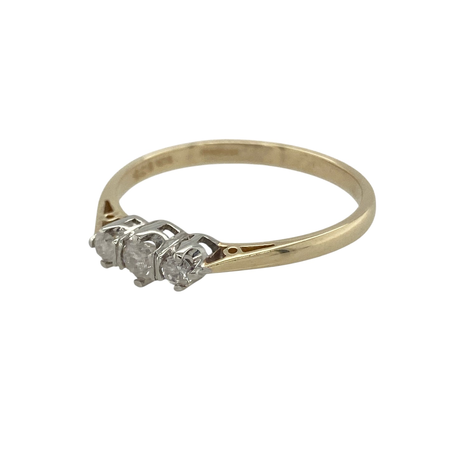 Bring classic sparkle and timeless elegance to your collection with this pre-owned 9ct yellow gold diamond trilogy ring—a refined design symbolising the past, present, and future.
Design: The ring features three brilliant-cut diamonds with a total diamond weight of approximately 0.25ct. The trio of stones represents love through time, while their bright sparkle adds understated sophistication. The diamonds have an approximate clarity of I2, giving the piece natural character and charm.