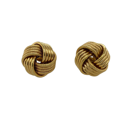 Bring classic charm and elegant texture to your collection with these pre-owned 9ct yellow gold patterned knot stud earrings, combining timeless design with refined detail—perfect for everyday wear or special occasions.
Design: The earrings feature a traditional knot design measuring 12mm, enhanced with a subtle patterned finish that adds depth and sophistication to the classic style.
Material: Made from 9-carat yellow gold