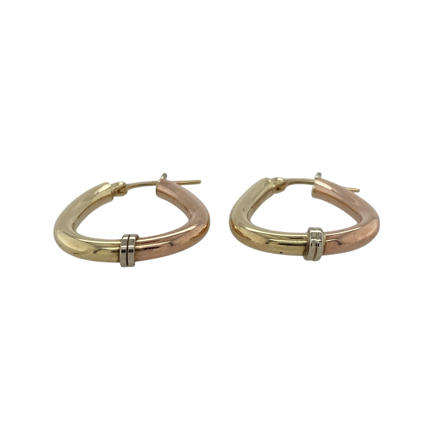 Bring elegant contrast and timeless sophistication to your collection with these pre-owned 9ct yellow, rose, and white gold oval creole earrings, combining classic style with a modern tri-colour twist—perfect for any occasion.
Design: Each earring features an oval creole shape crafted from interwoven bands of yellow, rose, and white gold, creating a harmonious blend of warm and cool tones with a refined finish.