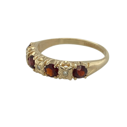 Bring warm colour and subtle sparkle to your collection with this pre-owned 9ct yellow gold diamond and garnet set band ring—perfect for adding a touch of classic elegance to any look.
Design: The ring features alternating 3mm round garnet stones and sparkling diamonds set across the band, creating a refined balance of rich red tones and radiant brilliance.
Material: Made from 9-carat yellow gold, the warm tone enhances the deep hue of the garnets and the sparkle of the diamonds for a timeless finish.