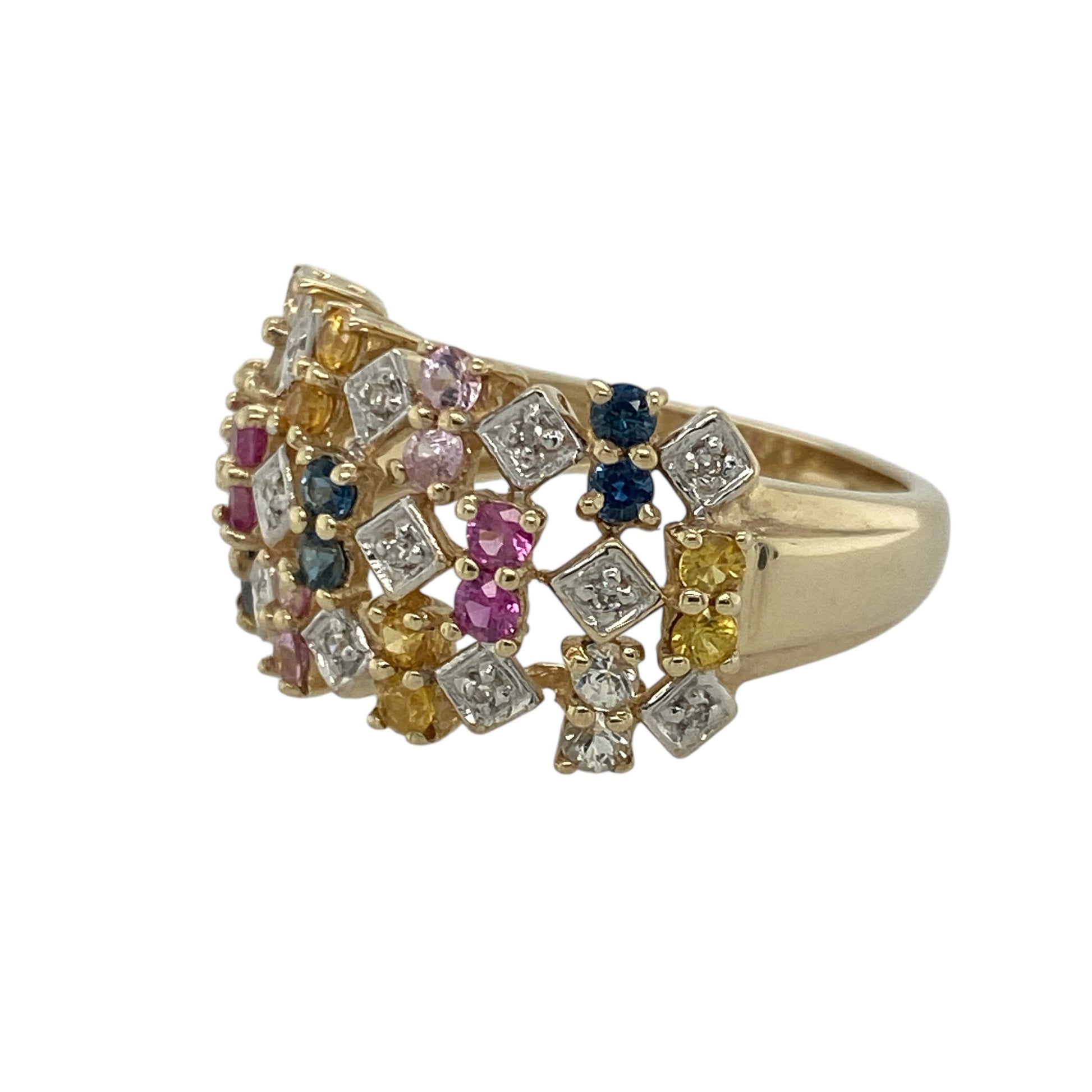 Add vibrant colour and contemporary elegance to your collection with this pre-owned 9ct yellow gold diamond and multicoloured sapphire set wide band ring — a striking piece that beautifully combines modern design with timeless luxury.
Design: The openwork band features an array of yellow, pink, and blue sapphires accented with sparkling diamonds, creating a lively display of colour and light across the 12mm wide band. The open design adds depth and dimension for a bold yet refined look.