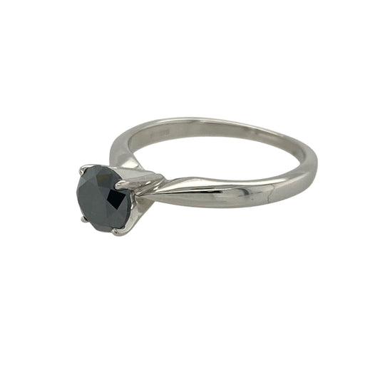 Add bold sophistication and contemporary elegance to your collection with this pre-owned 18ct white gold black diamond set solitaire ring — a striking piece that combines modern style with timeless allure.
Design: The ring features a brilliant-cut black diamond of approximately 0.76 carats, creating a captivating centrepiece with a rich, mysterious sparkle and sleek minimalist setting.