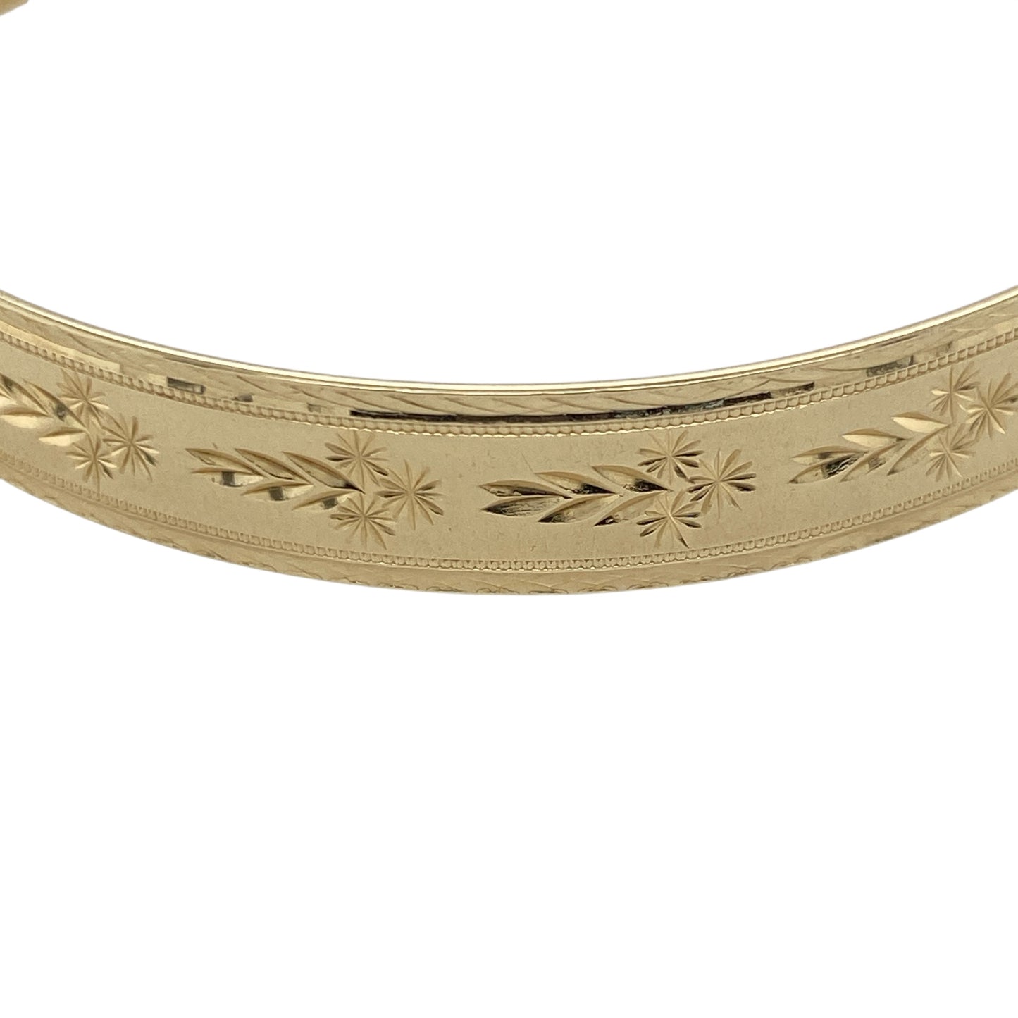 Pre-owned 9ct Solid Yellow Gold Patterned Expanding Bangle with the weight 15.50 grams and bangle width 9mm.