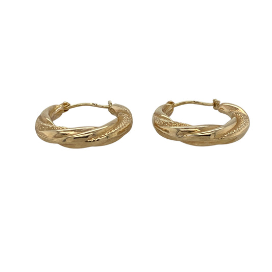 Add a touch of classic elegance and subtle sparkle to your collection with these pre-owned 9ct yellow gold patterned twist hoop creole earrings, combining timeless design with refined detailβperfect for everyday wear or special occasions.
Design: Each earring features a graceful twisted hoop shape with intricate patterned detailing, adding texture and shine from every angle.
Material: Made from 9-carat yellow gold, the polished finish enhances the warm golden tone and highlights the elegant twist design.