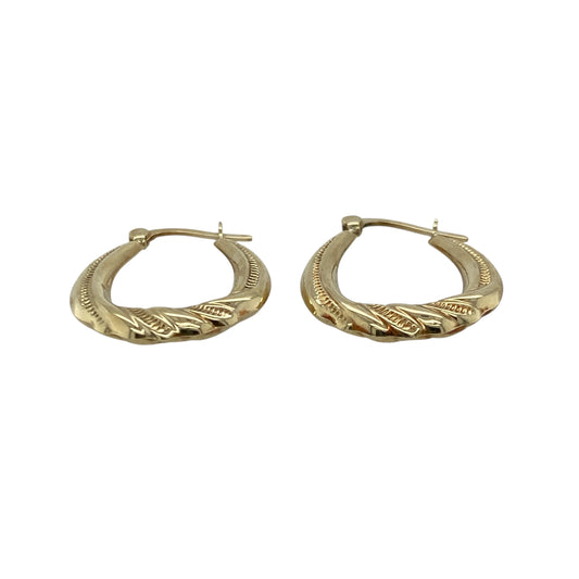 Add delicate shine and timeless style to your look with these pre-owned 9ct yellow gold patterned twist oval creole earrings, offering a classic design with elegant detailβperfect for everyday wear or subtle sophistication.
Design: Each earring features an oval creole shape with a refined twisted pattern, adding gentle texture and light-catching movement.
Material: Made from 9-carat yellow gold, the polished finish enhances the warm tone and highlights the intricate twist design.