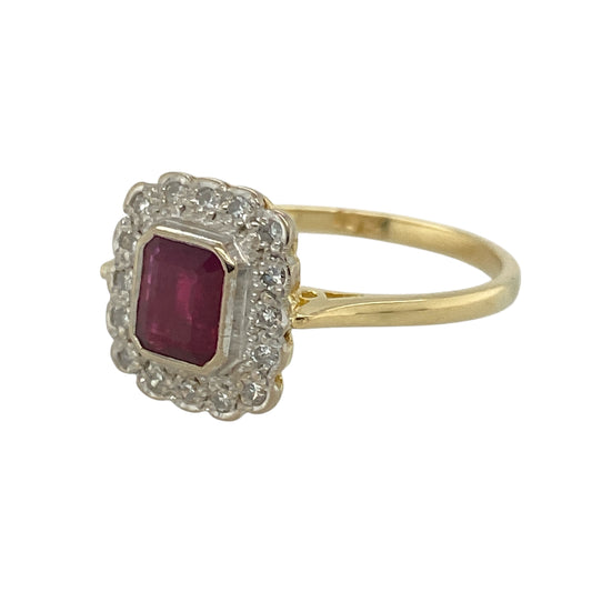 Bring vintage elegance and vibrant colour to your collection with this pre-owned 18ct yellow and white gold diamond and ruby set Art Deco style cluster ring—a timeless statement of glamour and sophistication.
Design: The ring showcases a 6mm by 5mm rectangular ruby at the centre, surrounded by a halo of sparkling diamonds arranged in a classic Art Deco geometric cluster for a refined and eye-catching finish.
