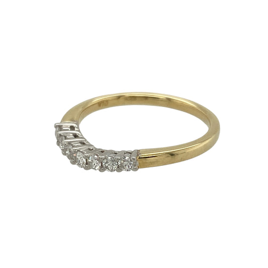 Bring subtle sparkle and timeless elegance to your collection with this pre-owned 18ct yellow gold diamond set slight wishbone band ring—a refined design perfect for both stacking and standalone wear.
Design: The ring features a gentle wishbone curve set with approximately 0.20ct of shimmering diamonds, creating a graceful shape that enhances engagement or statement rings when paired.