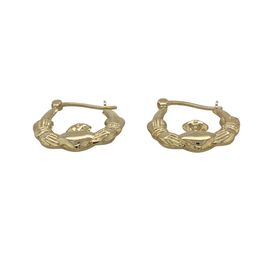 Bring meaningful symbolism and timeless charm to your collection with these pre-owned 9ct yellow gold Claddagh creole earrings—an elegant pair inspired by heritage and tradition.
Design: Featuring a classic creole hoop adorned with the iconic Claddagh motif—hands for friendship, a heart for love, and a crown for loyalty—these earrings offer a distinctive and heartfelt focal point.
Material: Made in 9-carat yellow gold, the polished finish highlights the intricate detailing with a warm, radiant shine.