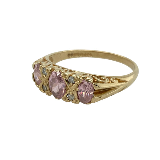Bring soft colour and graceful sparkle to your collection with this pre-owned 9ct yellow gold pink stone and cubic zirconia ringβan elegant piece offering feminine charm and timeless appeal.
Design: This size P ring features a 6mm by 4mm oval pink centre stone, complemented by shimmering cubic zirconia accents that create a bright, balanced look across the front.