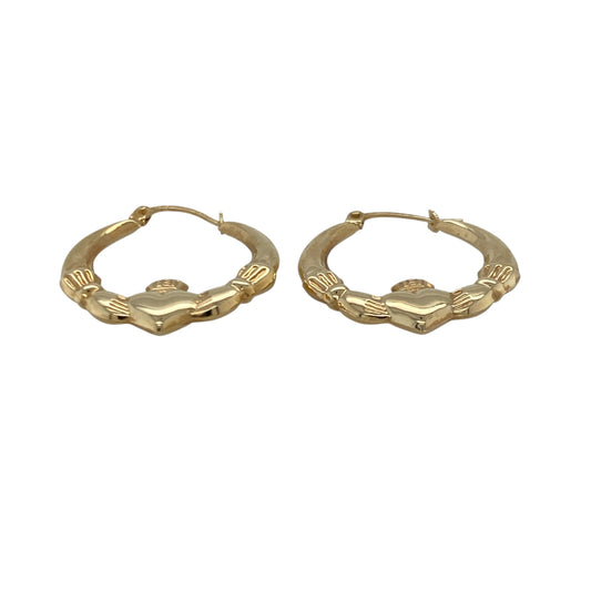 Bring meaningful symbolism and traditional charm to your collection with these pre-owned 9ct yellow gold Claddagh creole earrings—an elegant pair celebrating love, loyalty, and friendship.
Design: These delicate hoops feature the classic Claddagh motif—two hands holding a heart topped with a crown—beautifully incorporated into the creole shape for a timeless, symbolic look.
Material: Made from 9-carat yellow gold, the earrings offer a warm, polished shine that enhances their traditional design.