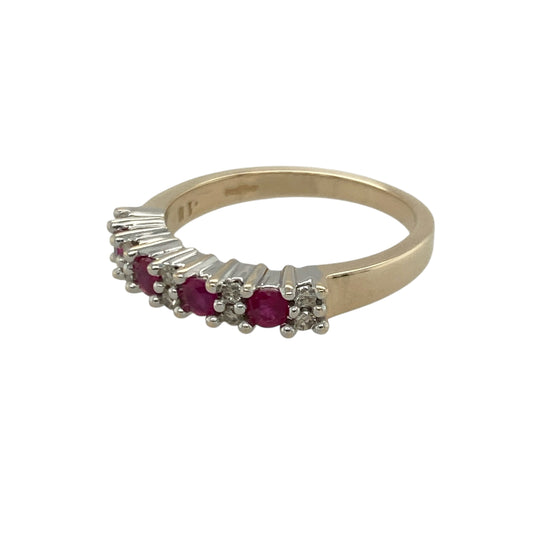 Bring rich colour and refined sparkle to your collection with this pre-owned 9ct yellow gold diamond and ruby band ring—an elegant piece offering timeless beauty and classic charm.
Design: This size N band features vibrant 3mm round rubies arranged across the front, each separated by two small diamonds for a balanced and eye-catching display of colour and brilliance.
Material: Made from 9-carat yellow gold, the warm tone enhances the deep red of the rubies and the bright sparkle of the diamonds.
