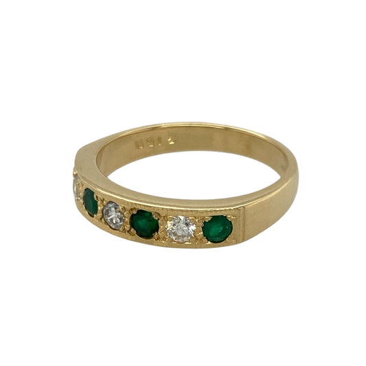 Bring rich colour and refined sparkle to your collection with this pre-owned 18ct yellow gold diamond and emerald band ring—an elegant piece offering timeless beauty and luxurious presence.
Design: This size O band features three vibrant 3mm round emeralds arranged across the front, complemented by diamonds totalling approximately 0.18ct for added brilliance and balance.