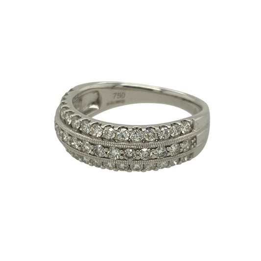 Bring bold brilliance and luxurious style to your collection with this pre-owned 18ct yellow gold three-row diamond band ring—an impressive piece offering radiant sparkle and timeless elegance.
Design: This size N band features a 7mm wide front adorned with three rows of dazzling diamonds, creating a striking light-catching display with exceptional presence.
Material: Made from 18-carat yellow gold, the rich, warm tone beautifully enhances the brightness and fire of the diamonds.