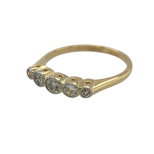 Bring vintage charm and refined sparkle to your collection with this pre-owned 18ct yellow gold diamond five-stone ring—an elegant piece offering timeless beauty and classic sophistication.
Design: This size M ring features five rubover-set diamonds arranged across the front, creating a smooth, flowing line of brilliance with a distinct vintage feel.
Material: Made from luxurious 18-carat yellow gold, the polished finish enhances its rich golden tone and highlights the clean, protective rubover settings.