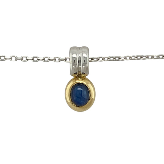 Bring elegant colour and refined two-tone detail to your collection with this pre-owned 18ct white and yellow gold blue stone pendant necklaceβan attractive piece offering timeless beauty and graceful sophistication.
Design: This oval pendant features a 5mm by 4mm sapphire-coloured blue stone framed in a smooth, classic setting, creating a bright and beautifully balanced focal point.