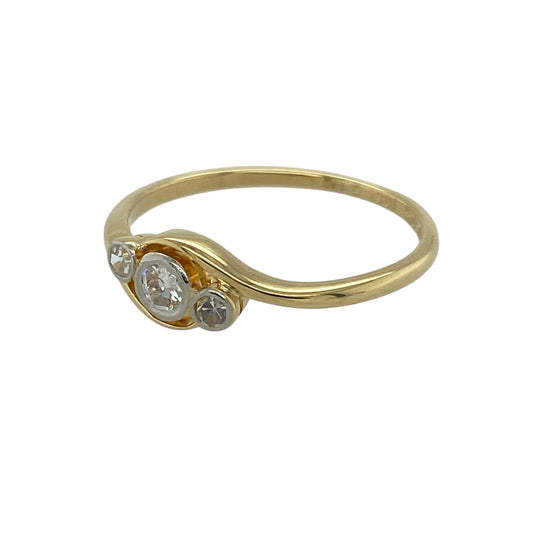 Bring classic charm and refined sparkle to your jewellery collection with this pre-owned 18ct yellow gold diamond rubover set trilogy twist ring — a beautifully vintage-inspired piece with elegant character.
Design: The ring features a graceful twist design holding three round diamonds in smooth rubover settings, creating a subtle yet eye-catching trilogy arrangement.
Material: Made from 18ct yellow gold, the warm polished finish enhances the vintage styling and highlights the brilliance of the diamonds.