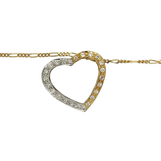 Bring timeless romance and elegant sparkle to your jewellery collection with this pre-owned 18ct yellow and white gold diamond open heart pendant on an 18" figaro chain β a luxurious piece with classic charm and refined brilliance.
Design: The pendant is approximately 2cm in length and features an open heart shape accented with delicate diamonds, creating a graceful, sparkling focal point.