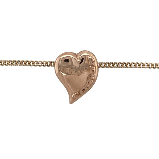 Bring heartfelt charm and elegant warmth to your jewellery collection with this pre-owned 9ct rose gold Clogau Cariad heart pendant on an 18" yellow gold curb chain β a meaningful piece celebrating love and connection.
Design: The pendant measures 1.5cm in length and features the iconic Clogau Cariad heart motif, showcasing graceful curves and sentimental design in soft rose gold.