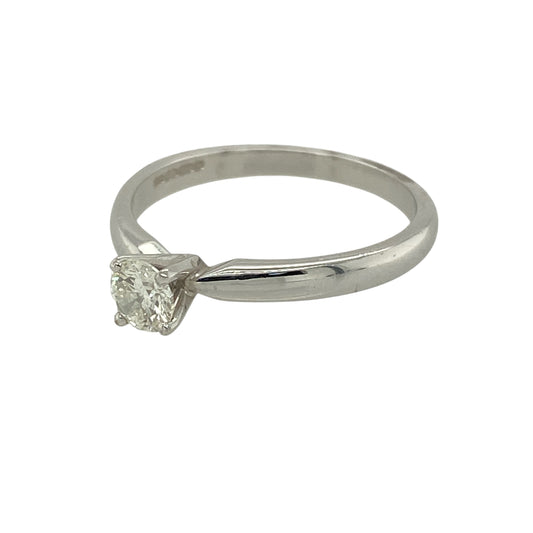 Bring classic elegance and refined sparkle to your jewellery collection with this new 18ct white gold diamond solitaire ring — a timeless piece with bright, graceful charm.
Design: The ring features an approximately 0.25ct brilliant-cut diamond at the centre, offering lively, eye-catching sparkle in a traditional solitaire setting.
Material: Made from 18ct white gold, the polished finish enhances the cool, luxurious tone of the metal and beautifully complements the diamond’s natural brilliance.