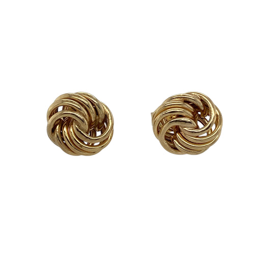 Bring classic elegance and subtle golden shine to your collection with these pre-owned 9ct yellow gold knot stud earrings—timeless pieces that offer refined simplicity and everyday versatility.
Design: These charming studs feature a 9mm knot design, symbolising unity and connection while adding gentle texture and visual interest. Their polished finish enhances the curves of the knot, creating a soft, radiant glow.