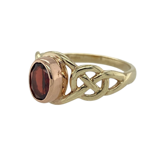 Bring rich colour and traditional symbolism to your jewellery collection with this pre-owned 9ct yellow and rose gold Clogau garnet Celtic ring β a meaningful piece with warm tones and timeless character.
Design: The ring features a 7mm by 5mm oval garnet at the centre, showcased within an elegant Celtic-inspired pattern that reflects heritage and artistry.
Material: Made from 9ct yellow and rose gold, the combination of metals enhances the depth of the garnet and adds a distinctive, decorative contrast.