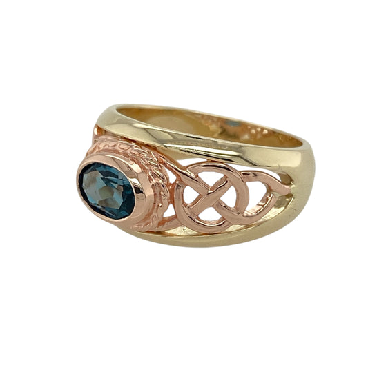 Bring vibrant colour and meaningful heritage to your collection with this pre-owned 9ct yellow and rose gold Clogau Celtic ringβan elegant piece that pairs striking blue topaz with timeless Celtic symbolism.
Design: This refined ring features a 7mm by 5mm oval blue topaz at the centre, offering bright, uplifting colour and a captivating focal point. The gemstone is framed by an intricate Celtic-inspired motif, adding depth, texture, and expressive heritage detail to the design.