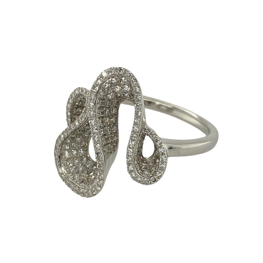 Bring dazzling sparkle and contemporary elegance to your collection with this pre-owned 18ct white gold diamond pavé swirl ring—an eye-catching statement piece with luxurious presence.
Design: This striking ring features a flowing swirl design, pavé set with diamonds to create exceptional brilliance and movement. The front of the ring measures approximately 1.9cm long, giving it a bold, elegant silhouette that catches the light beautifully.