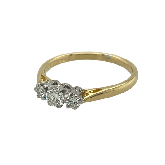 Bring timeless elegance and meaningful sparkle to your jewellery collection with this pre-owned 18ct yellow gold & diamond set trilogy ring, offering classic design with beautiful balance and brilliance.
Design: The ring features a traditional trilogy arrangement, with a central diamond flanked by two smaller diamonds, creating a harmonious and elegant focal point.