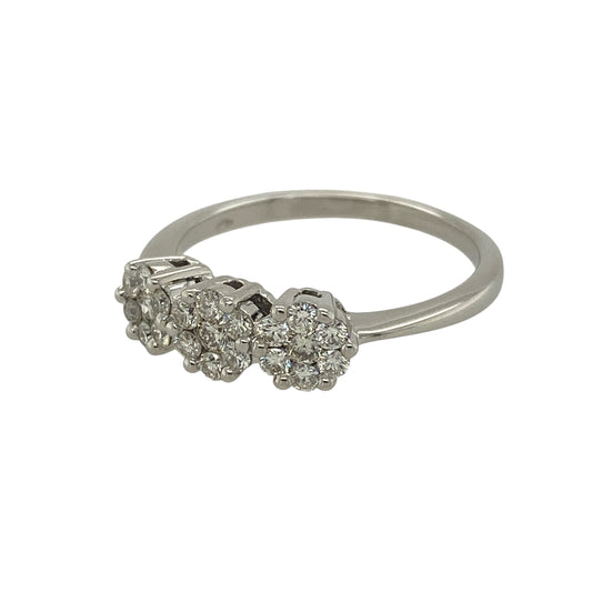 Bring classic elegance and radiant sparkle to your jewellery collection with this pre-owned 9ct white gold & diamond set cluster trilogy ring, combining timeless design with beautiful brilliance.
Design: The ring features a trilogy arrangement with clustered diamond settings, creating three sparkling focal points that give added depth and visual impact across the band.
Material: Made from 9-carat white gold, the bright polished finish enhances the diamonds and lends a clean, refined look.
