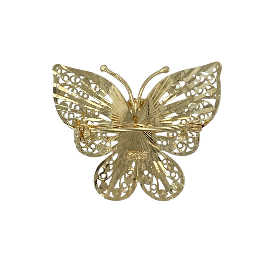 Bring delicate charm and timeless elegance to your jewellery collection with this pre-owned 9ct yellow gold butterfly brooch, offering graceful design with classic appeal.
Design: The brooch features a beautifully shaped butterfly motif, symbolising transformation and beauty, with fine detailing that gives it a light and elegant appearance.
Material: Made from 9-carat yellow gold, the warm polished finish enhances the contours of the butterfly and adds a rich golden glow.