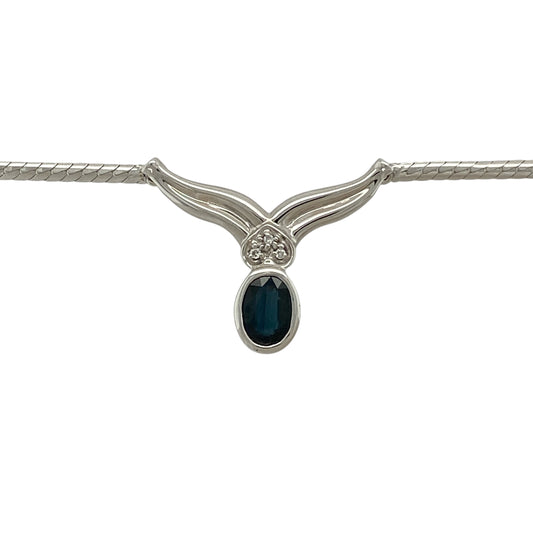 Bring classic elegance and refined colour to your jewellery collection with this pre-owned 9ct white gold diamond & sapphire set necklace, a timeless design that pairs rich blue tones with subtle sparkle.
Design: The necklace features a 7mm by 5mm oval sapphire as the focal point, accented with diamonds that enhance its depth of colour and add gentle brilliance.