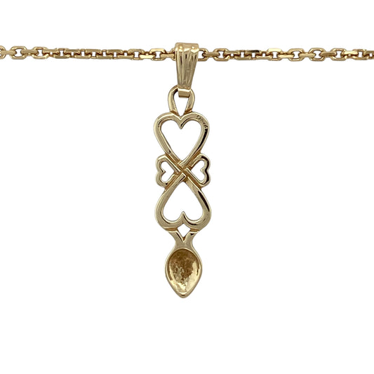 Bring romantic symbolism and traditional Welsh charm to your jewellery collection with this pre-owned 9ct yellow gold Welsh lovespoon pendant necklace, a meaningful piece rich in heritage.
Design: The necklace features a detailed Welsh lovespoon pendant, a traditional symbol of love and commitment, suspended from a classic belcher chain for a timeless finish.
Material: Made from 9-carat yellow gold, the warm polished tone highlights the intricate detail of the lovespoon and enhances its enduring appeal.