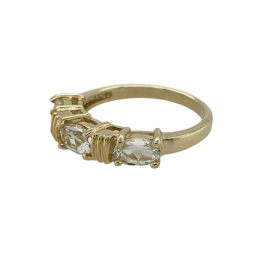 Bring cool colour and refined elegance to your jewellery collection with this pre-owned 9ct yellow gold glacier topaz set band ring, a distinctive design with timeless appeal.
Design: This ring features a series of oval glacier topaz stones arranged across the band, creating a beautiful line of icy blue colour with a clean, elegant finish.
Material: Made from 9-carat yellow gold, the warm polished finish provides a striking contrast to the cool tones of the glacier topaz.