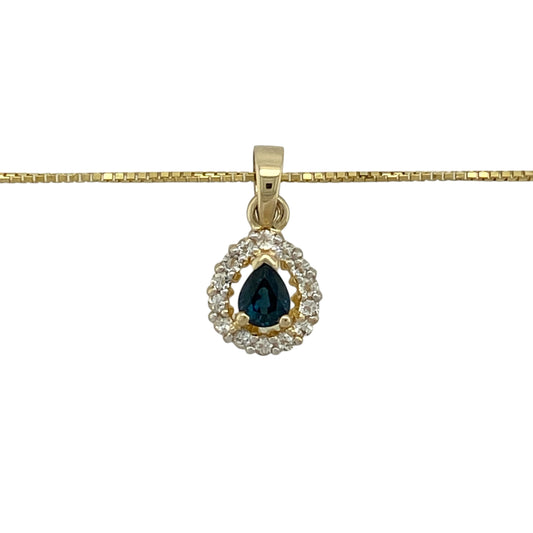 Bring classic colour and elegant sparkle to your jewellery collection with this pre-owned 9ct yellow gold sapphire and cubic zirconia set teardrop cluster pendant necklace.
Design: The pendant features a teardrop-shaped sapphire measuring approximately 5mm by 4mm, surrounded by shimmering cubic zirconia to create a refined cluster design. The pendant measures approximately 1.8cm in length including the bail.