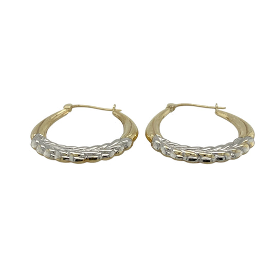 Bring elegant contrast and decorative detail to your jewellery collection with these pre-owned 9ct yellow and white gold patterned hoop creole earrings.
Design: The earrings feature a classic hoop creole shape with patterned detailing, combining yellow and white gold tones for added visual interest and refined style.
Material: Made from 9-carat yellow and white gold, the contrasting polished finishes beautifully highlight the patterned design.