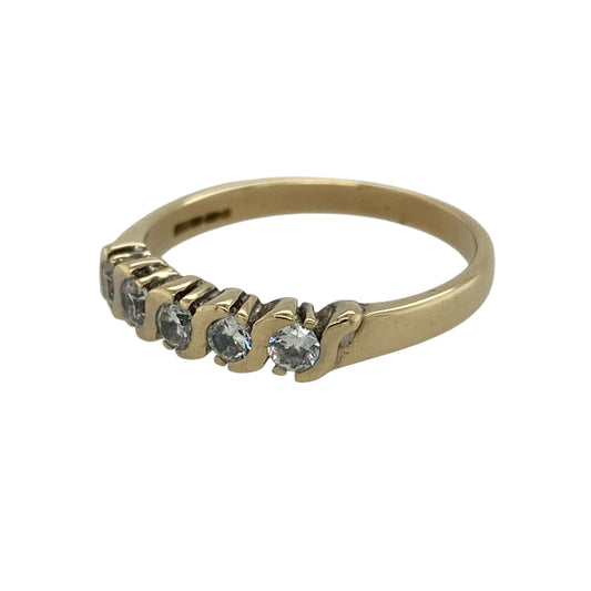 Bring subtle sparkle and classic style to your jewellery collection with this pre-owned 9ct yellow gold cubic zirconia set band ring, offering a refined and versatile look—perfect for everyday wear or special occasions.
Design: The ring features a row of round cubic zirconia stones, each measuring approximately 3mm in diameter, creating a clean and balanced band style with eye-catching brilliance.