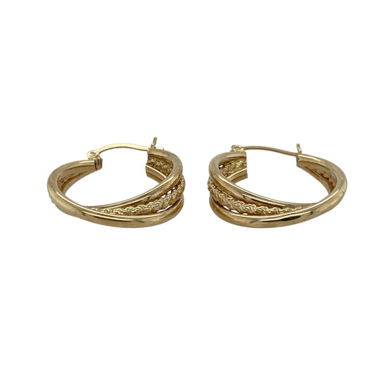 Bring texture and classic elegance to your jewellery collection with these pre-owned 9ct yellow gold rope detail twist hoop creole earrings, featuring a timeless design with added depth and character—ideal for everyday wear or special occasions.
Design: The earrings display a twisted hoop creole style with rope-style detailing, creating a beautifully textured and eye-catching finish.