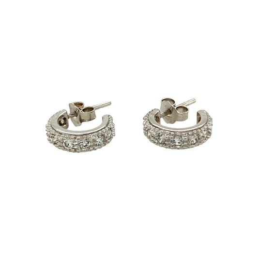 Add a touch of elegance to your jewellery collection with these pre-owned 18ct white gold and cubic zirconia set half hoop stud earrings, featuring:
Design: Classic half hoop stud earrings, set with sparkling cubic zirconia for a timeless and sophisticated look.
Material: Crafted from 18-carat white gold, offering a sleek and luxurious finish.
Weight: A well-balanced 3.40 grams, ensuring durability while remaining comfortable to wear.
A versatile and stylish accessory, perfect for adding subtle sparkle to