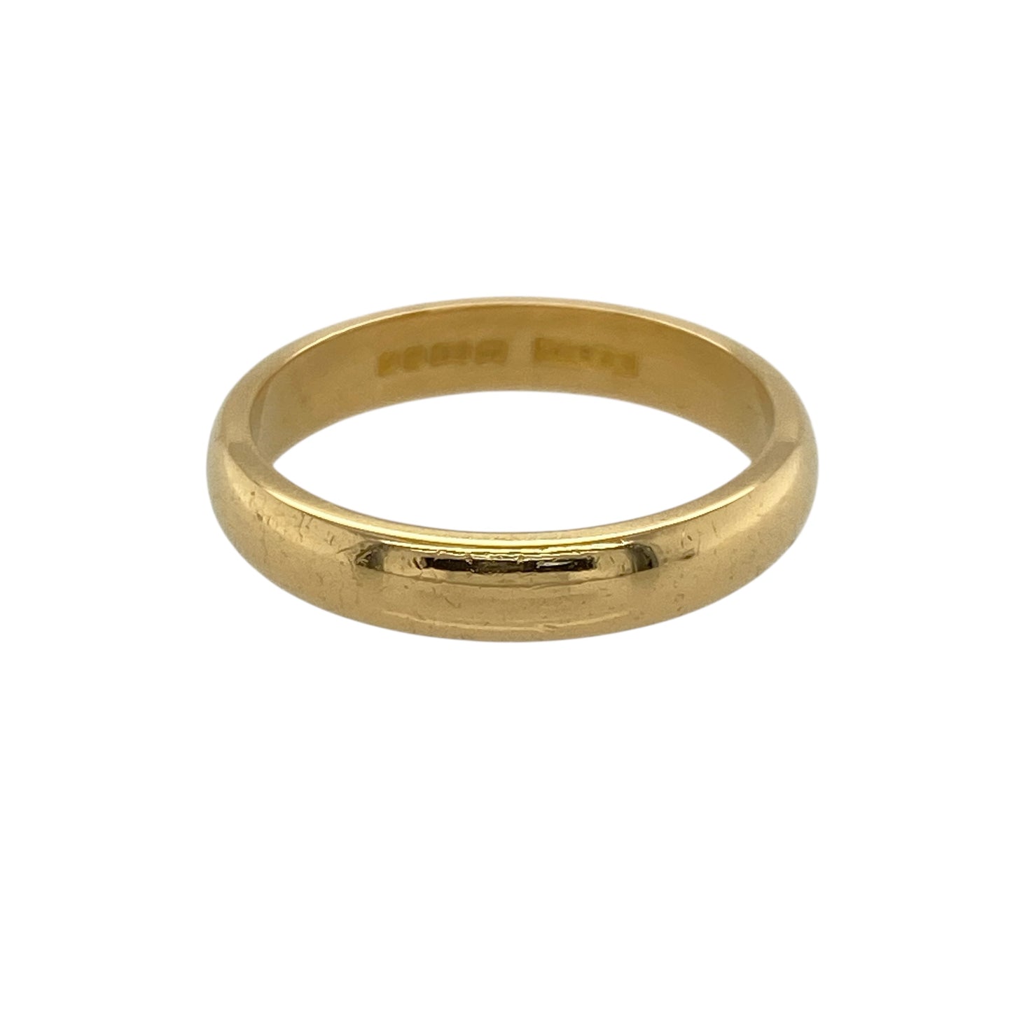 Embrace tradition and rich colour with this pre-owned 22ct gold wedding band ring—classic, timeless, and full of lasting significance.
Design: The band measures 3mm wide with a smooth, polished surface and a traditional court profile for comfort and enduring style.
Material: Made from 22-carat gold, the ring showcases a deep, warm yellow tone that reflects the high purity and classic elegance of this precious metal.