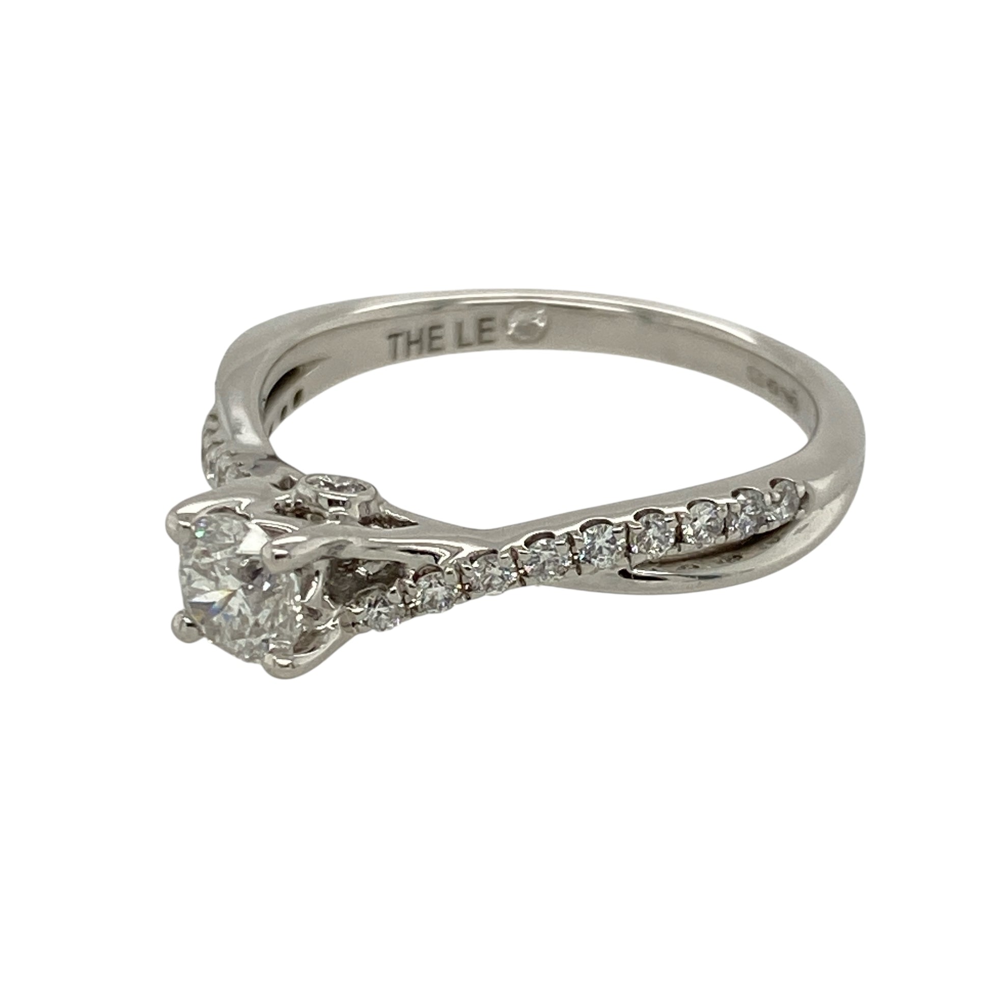 Bring timeless elegance and refined sparkle to your jewellery collection with this pre-owned 18ct white gold solitaire ring, featuring a brilliant-cut diamond centre and diamond-set shoulders—perfect for special occasions or lasting everyday luxury.
Design: The ring showcases a central brilliant-cut diamond, complemented by smaller diamonds along the shoulders, with approximately 0.66ct of total diamond content for a dazzling finish.