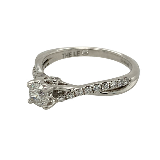 Bring timeless elegance and refined sparkle to your jewellery collection with this pre-owned 18ct white gold solitaire ring, featuring a brilliant-cut diamond centre and diamond-set shoulders—perfect for special occasions or lasting everyday luxury.
Design: The ring showcases a central brilliant-cut diamond, complemented by smaller diamonds along the shoulders, with approximately 0.66ct of total diamond content for a dazzling finish.