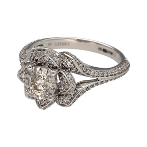 New 9ct White Gold & Diamond Set Flower Ring in size M with the weight 4.30 grams. The front of the ring is 13mm high and the ring contains approximately 1.15ct of diamond content in total. The diamonds are approximate clarity Si