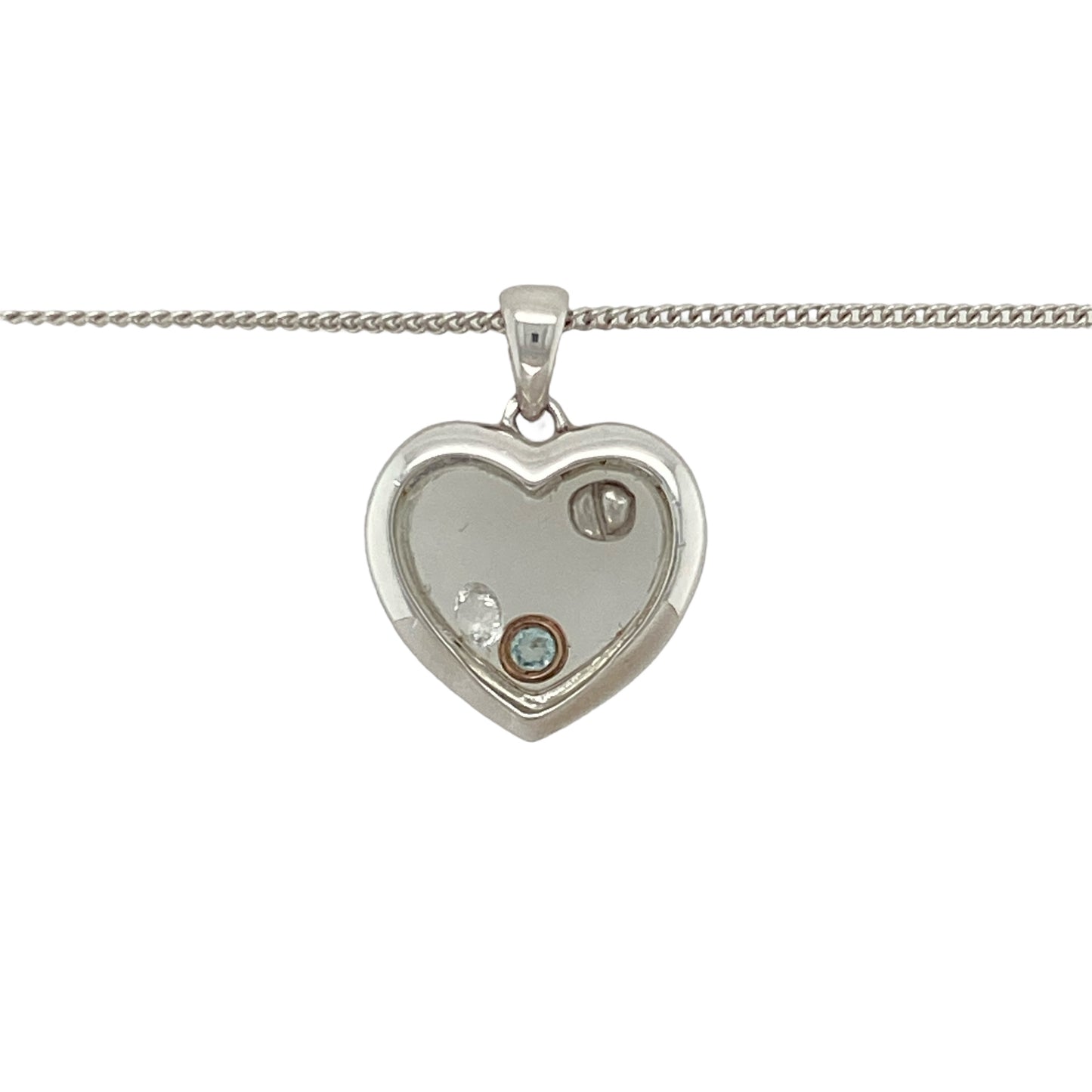 Bring romantic elegance and sparkling detail to your jewellery collection with this pre-owned 925 silver and 9ct rose gold Clogau heart pendant necklace, encased with gemstones and suspended on an adjustable chain—perfect for heartfelt gifting or timeless everyday wear.
Design: The pendant measures 2.1cm in length including the bail and features a polished heart design in silver, delicately encased with gemstones and accented with warm 9ct rose gold for a radiant and graceful finish.