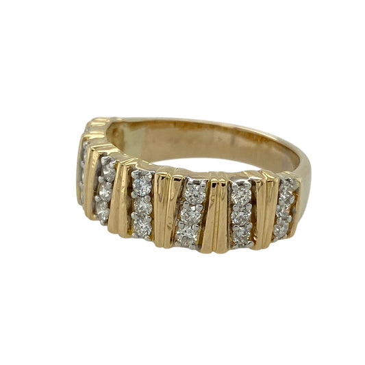 Bring bold elegance and refined sparkle to your jewellery collection with this pre-owned 18ct yellow gold diamond set striped band ring, offering a striking design with timeless appeal—perfect for everyday wear or statement styling.
Design: The ring features a striped band design accented with diamond detailing, with the front measuring approximately 6mm in width to create a strong and balanced profile.