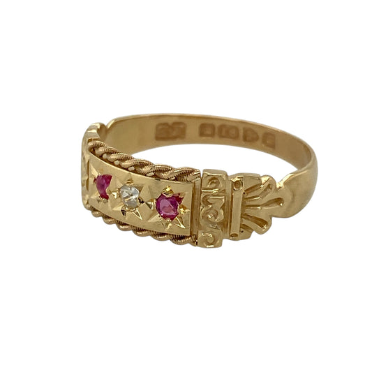 Bring rich history and timeless elegance to your jewellery collection with this pre-owned 18ct yellow gold diamond and ruby set Chester hallmark vintage ring, dating to the early 1900s and showcasing beautiful period detail—perfect for collectors or lovers of antique jewellery.
Design: The ring features a 6mm wide front set with a central diamond, flanked by a ruby on either side, creating a balanced and classic three-stone layout typical of the era.