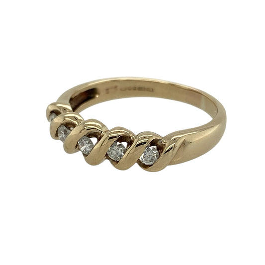 Add flowing elegance and eye-catching sparkle to your jewellery collection with this pre-owned 9ct yellow gold and diamond set wave band ring, offering a graceful design with timeless appeal—perfect for everyday wear or special occasions.
Design: The ring features a softly contoured wave-style band with a front width of approximately 5mm, set with diamonds that follow the flowing lines of the design.